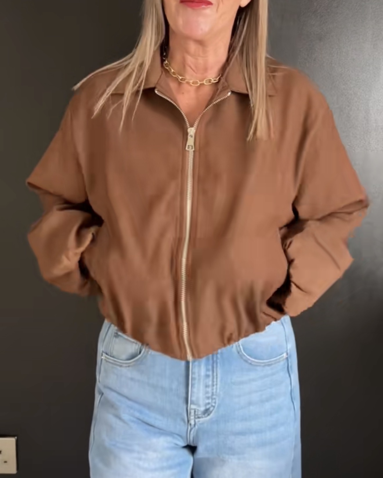 Chocolate brown bomber jacket.