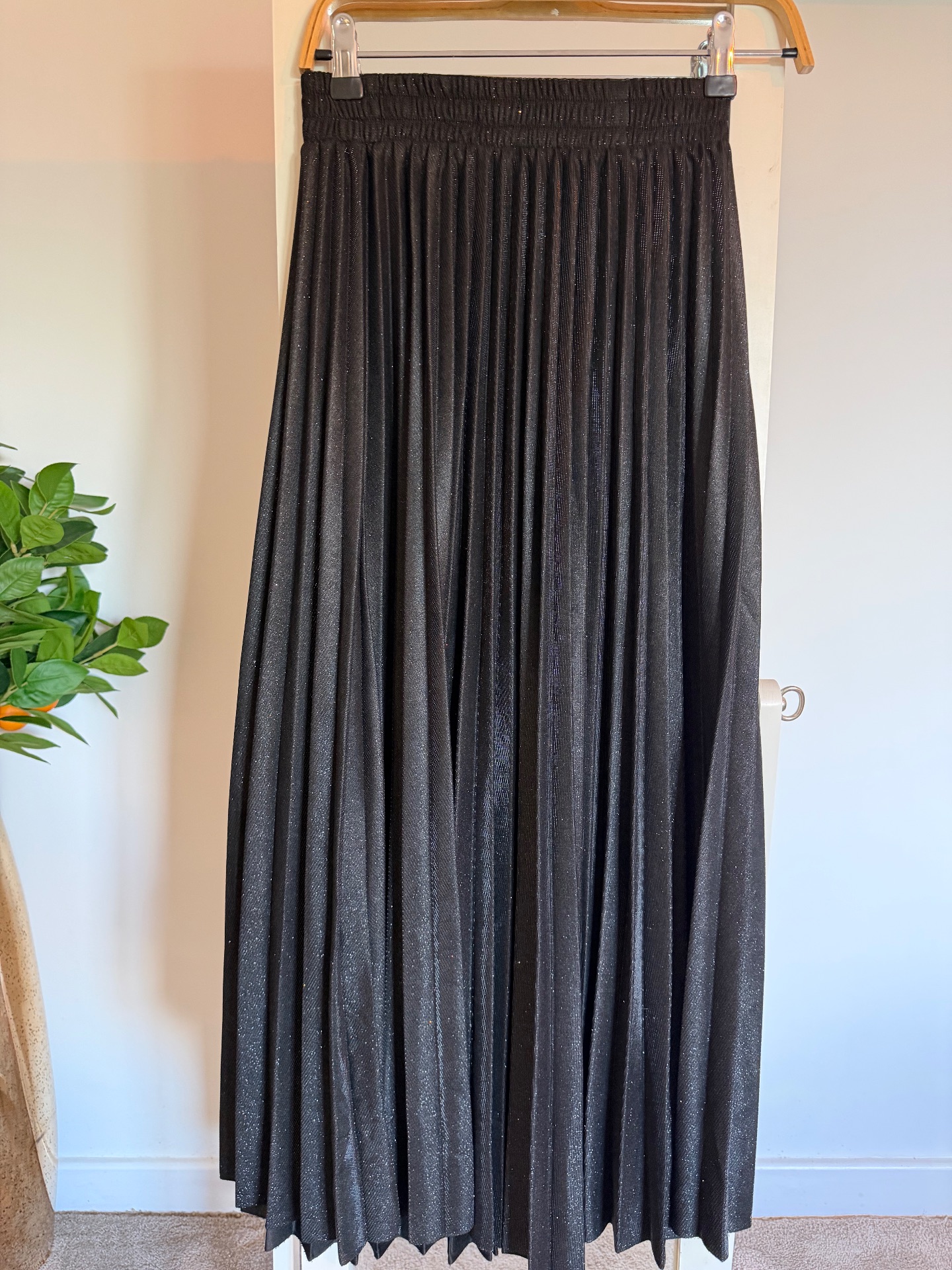Black pleated skirt with silver running through